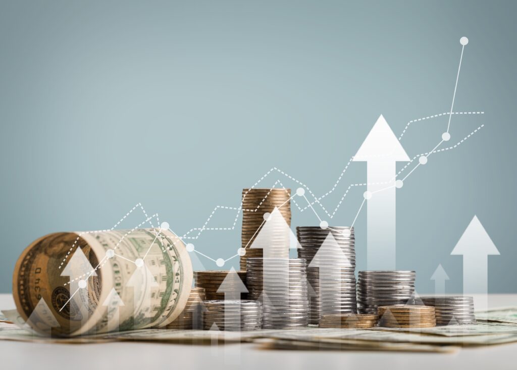 stack of coins with trading chart in financial concepts and financial investment business stock growth